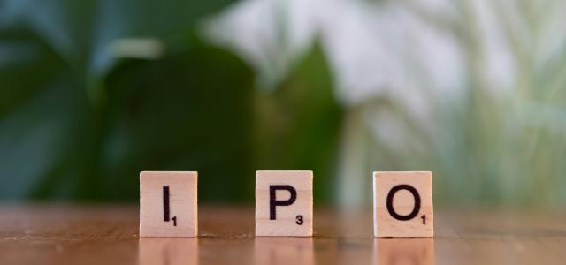 A wooden block spelling the word ipo on a table by Markus Winkler courtesy of Unsplash.